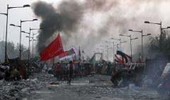ifmat - Iraqi protestors target Tehran-backed militias