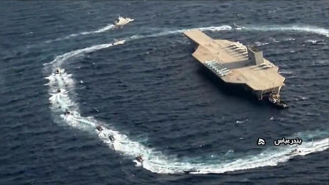 ifmat - Iran criticized after carrying out military exercises against dummy US aircraft carrier
