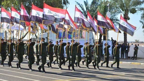 ifmat - In show of armed power pro-Iran factions hold parade in Iraq