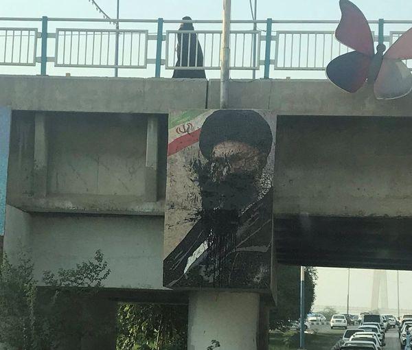 ifmat - Soccer Fans Tear Down Khamenei Soleimani Banners In Iran